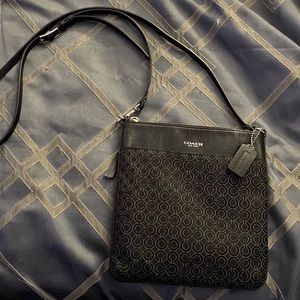 Small black Coach crossover purse